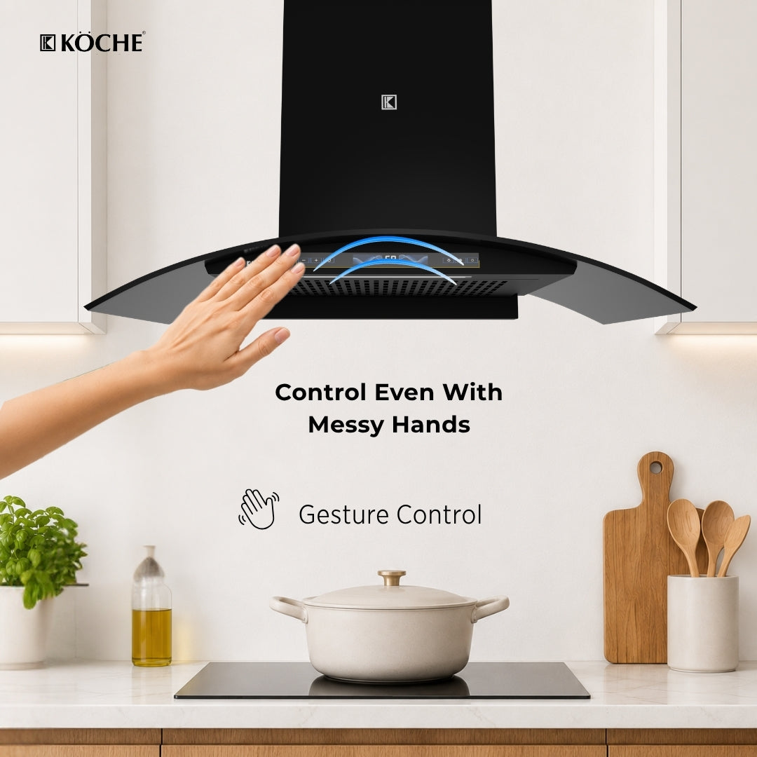 Köche Enzo 90 kitchen chimney with gesture control for touch-free operation.