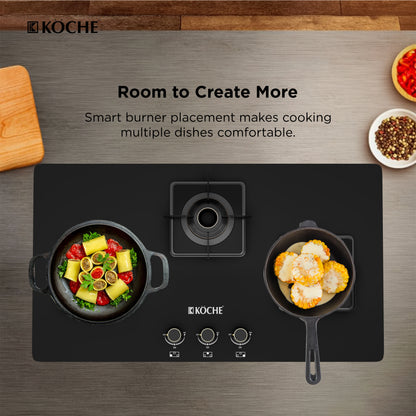 Koche hob with two burners cooking food on a wooden countertop
