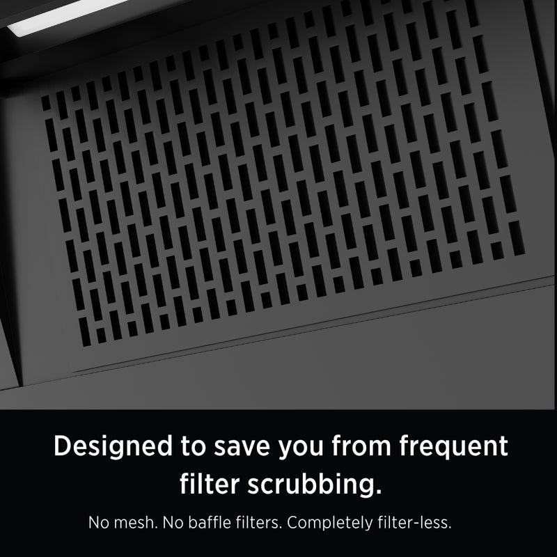   Laura 90cm Ducted BLDC Chimney | 1650 CMH Suction | Auto Clean A close-up of a dark gray perforated metal panel with a black lower text banner reading, 'Designed to save you from frequent filter scrubbing.' 