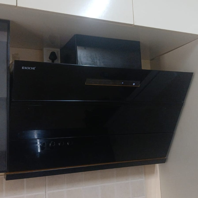   Laura 90 BLDC Chimney Köche Laura chimney in modern kitchen with sleek design and wall-mounted installation 