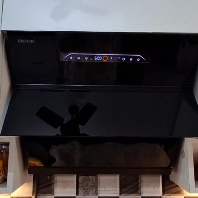  Laura 90 BLDC Chimney Köche Laura chimney installed in a modern kitchen with digital display and sleek design 