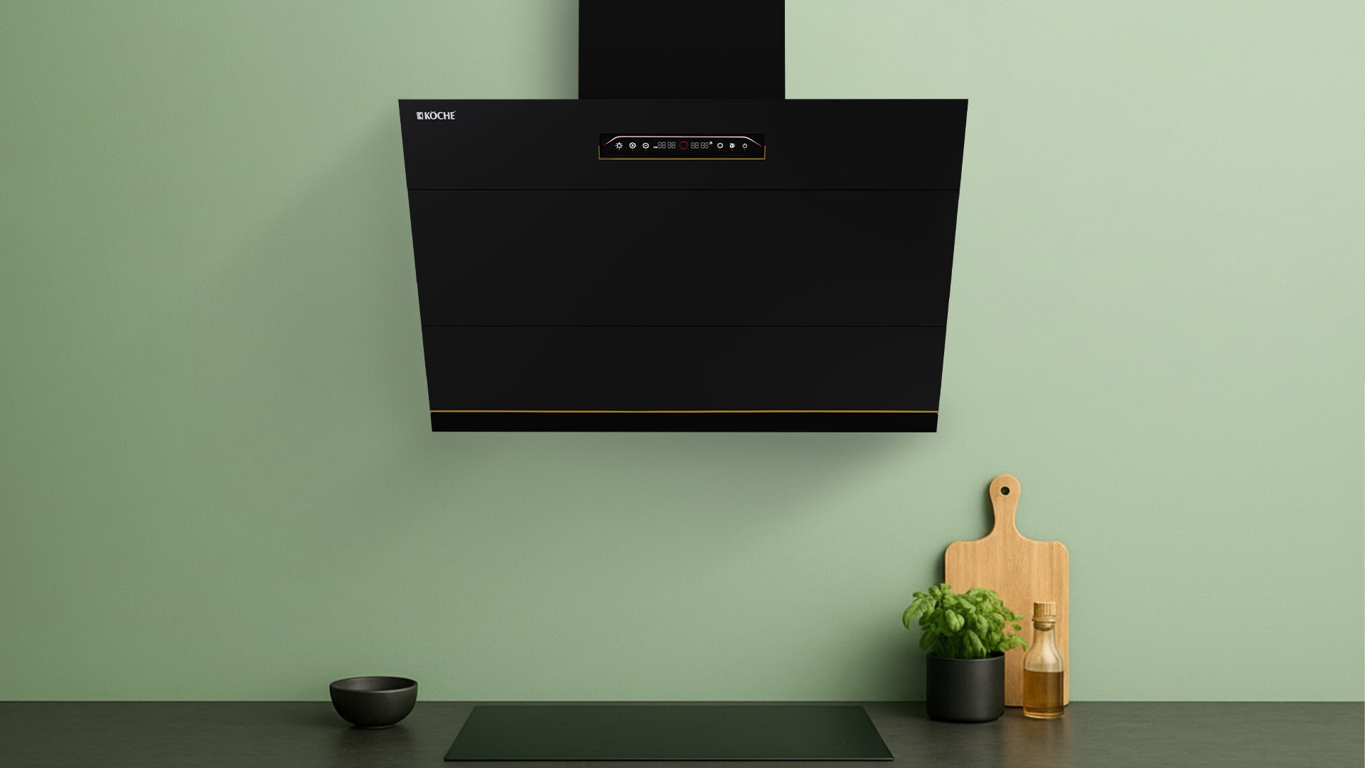 Köche Laura black chimney installed in a modern green kitchen.